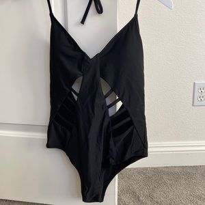 Express Swim black one piece bathing suit size medium with cutout details